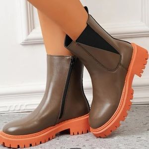 NWOT….water resistant, Chelsea style boots. Women size 7. Make me an offer!